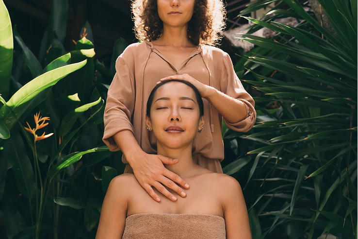 two women meditating